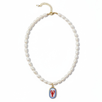 Pearl necklace with a decorative loster pendant on a white background